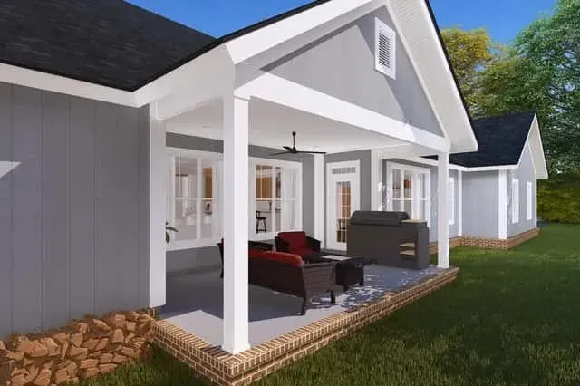 Farmhouse plan 52269WM side elevation showing 3-car side-load garage and dormered second story