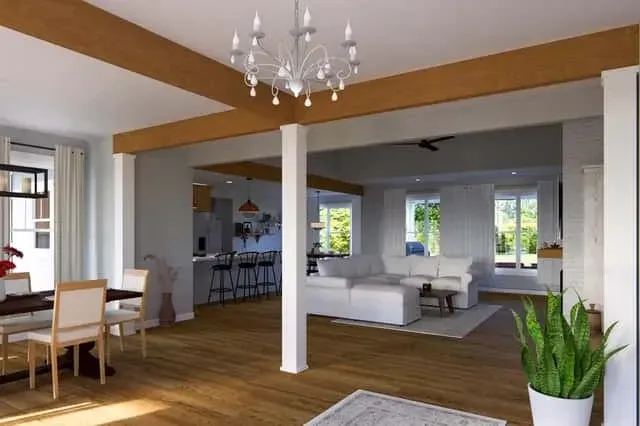 Open concept dining nook connected to kitchen and vaulted living room