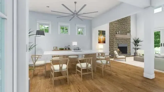 Upstairs loft game room in Plan 16919WG overlooking two-story family room with balcony railing West Elm Haven sectional billiards table and built in entertainment wall