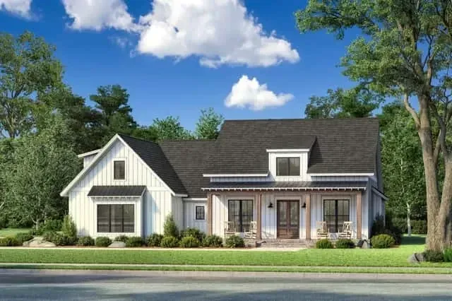Angled front porch view showing timber beam span, standing seam metal porch roof and architectural shingle main roof