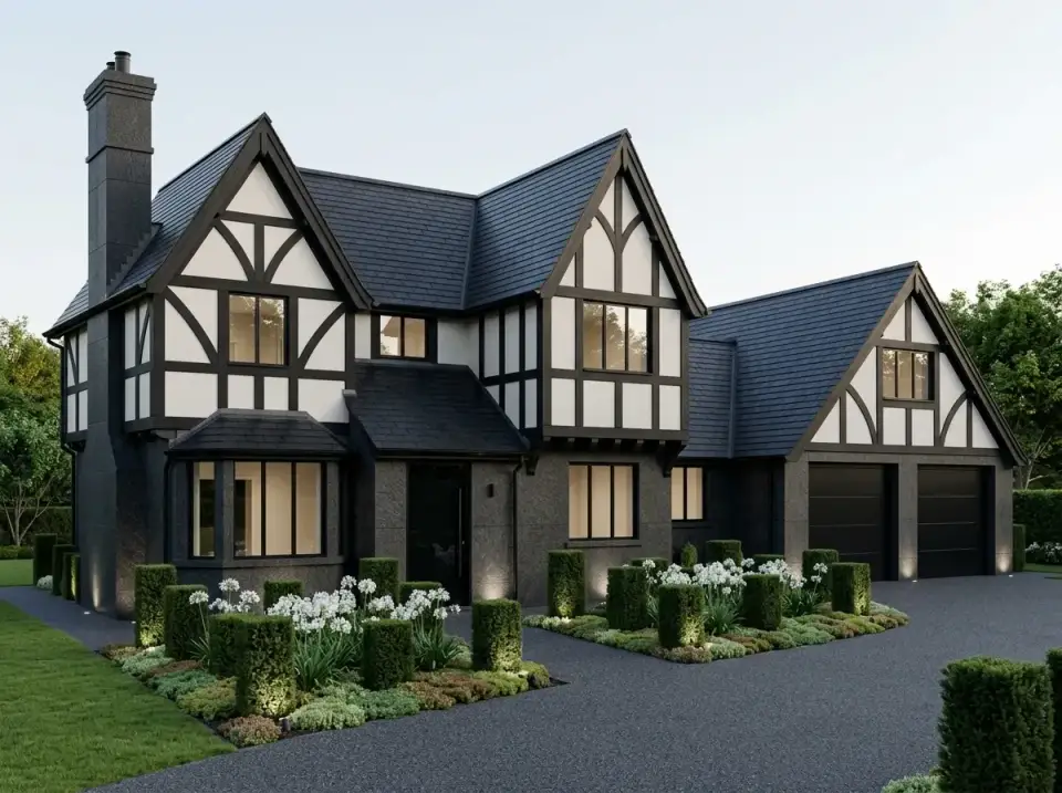 Monochrome contemporary facade in charcoal and black with uplighting and clipped boxwood hedges