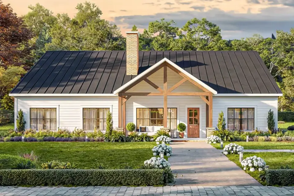 Front elevation of 2,866 sq ft modern farmhouse with dominant side-gable metal roof and timber truss entry