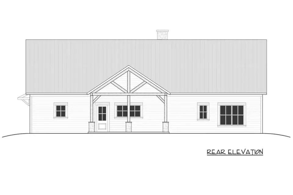 Streetscape view of 4-bedroom farmhouse with attached 2-car garage