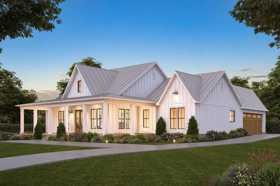 Three-quarter view showing the wraparound porch returning along the side elevation