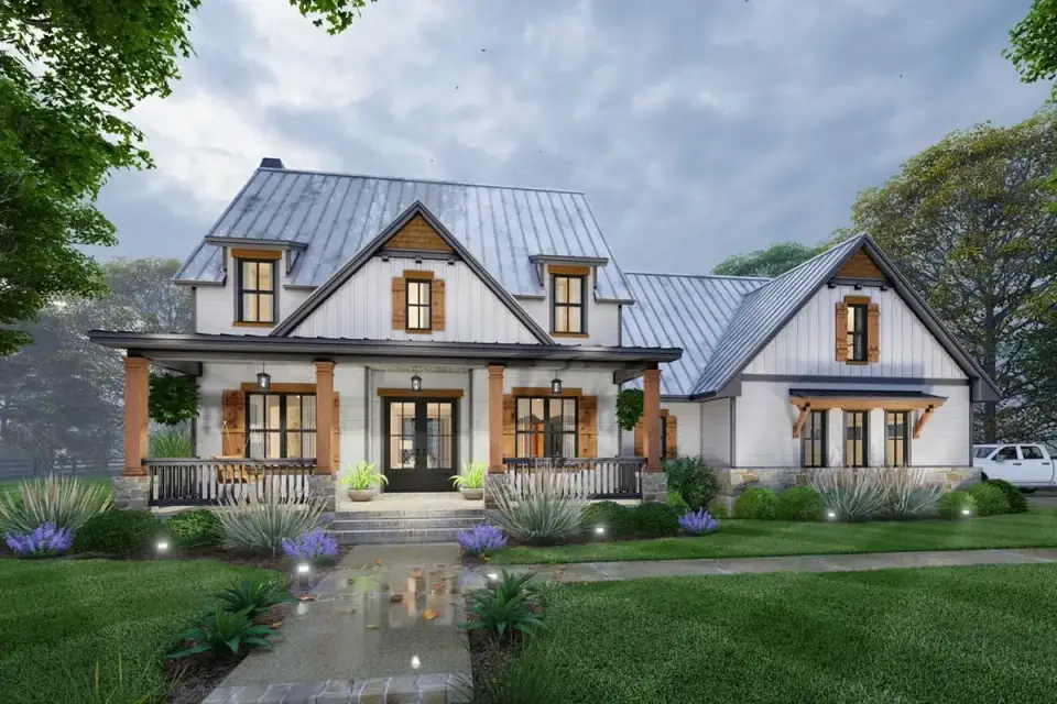 Aerial view of Plan 16919WG showing full roof massing multiple front gables standing seam metal porch roof accents and dark asphalt shingle primary roof