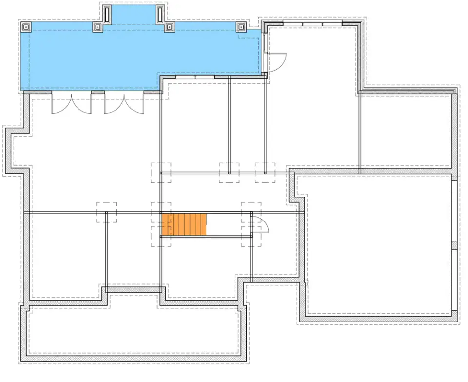 Unfinished lower level option for Plan 16919WG providing full basement footprint for future rec room media room or additional bedroom conversion