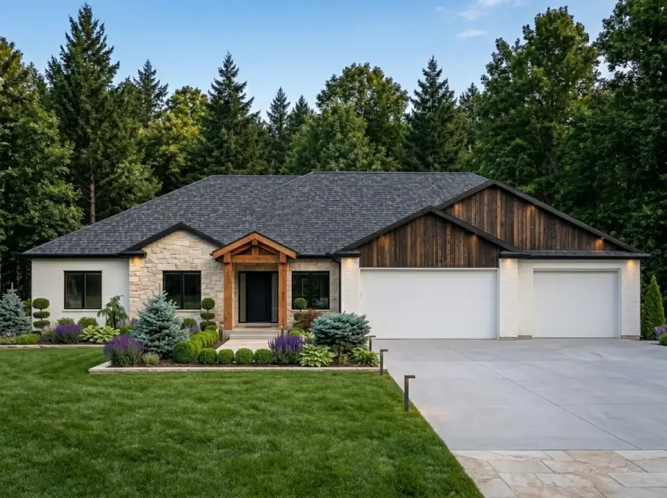 Rustic modern Craftsman facade with stone, white painted brick, and wood slats