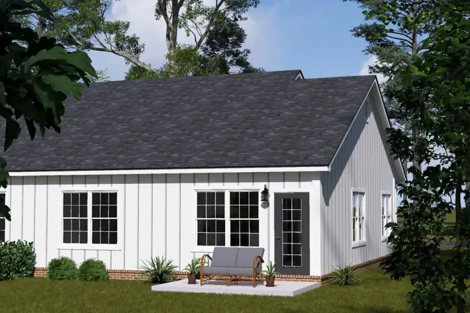 Plan 52532WM rear elevation modern ranch duplex with symmetrical great room glazing primary suite windows and grade-level patio area for both units