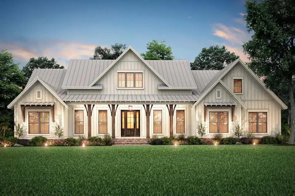 Front three-quarter view of Plan 51814HZ showing the symmetrical composition of the entry gable, Marvin Ultimate Ebony windows, and the relationship between the two-car garage and the covered front porch