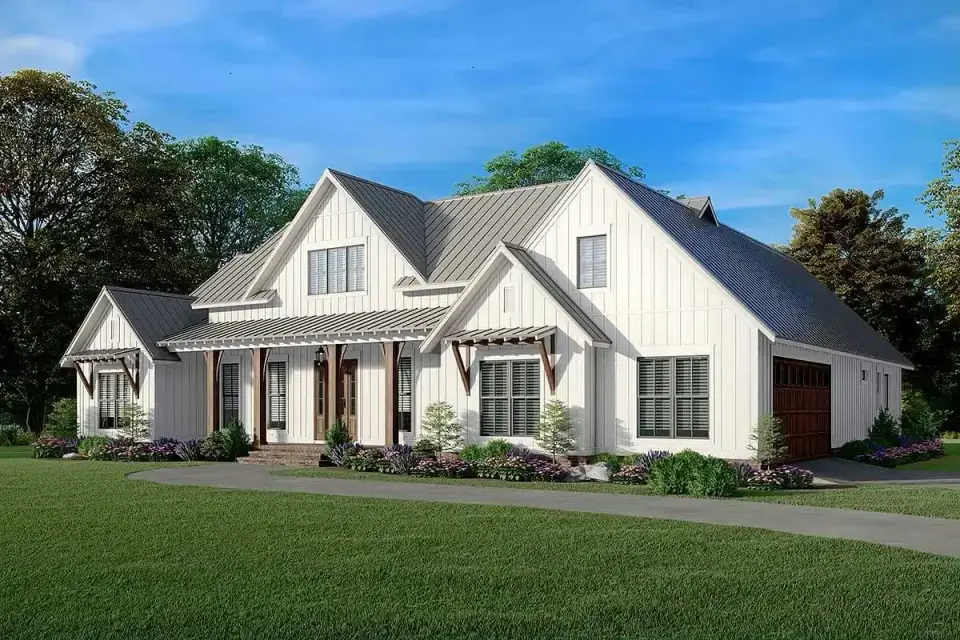 Side elevation showing the primary suite gable, the relationship to the rear covered porch, and the vertical board-and-batten pattern continuing across the entire facade