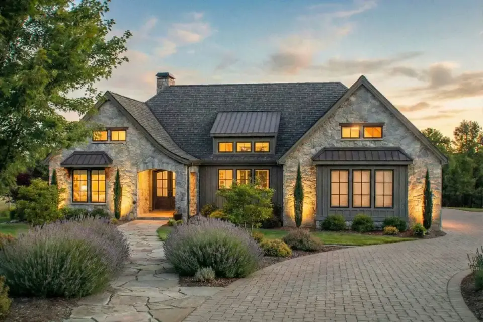 French country house plan exterior front elevation with stone and arched entry