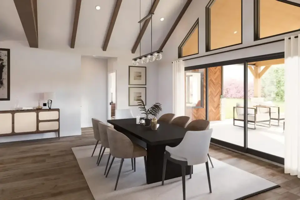 View of the kitchen island seating with three counter stools and sight-line across to the great room fireplace