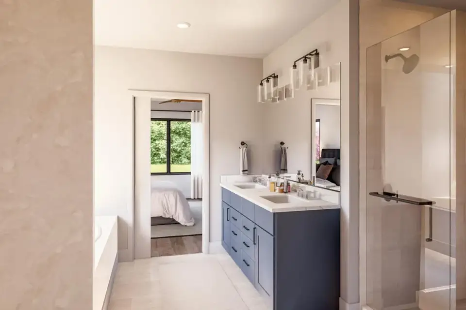 Walk-in closet in the primary suite with built-in hanging rods, shelving, and a pass-through doorway into the laundry room