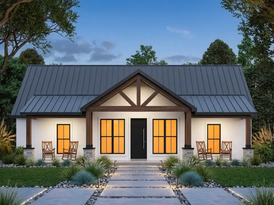 Contemporary white farmhouse facade with crisp stucco siding, dark timber trim, sleek black door, and ornamental grass landscaping