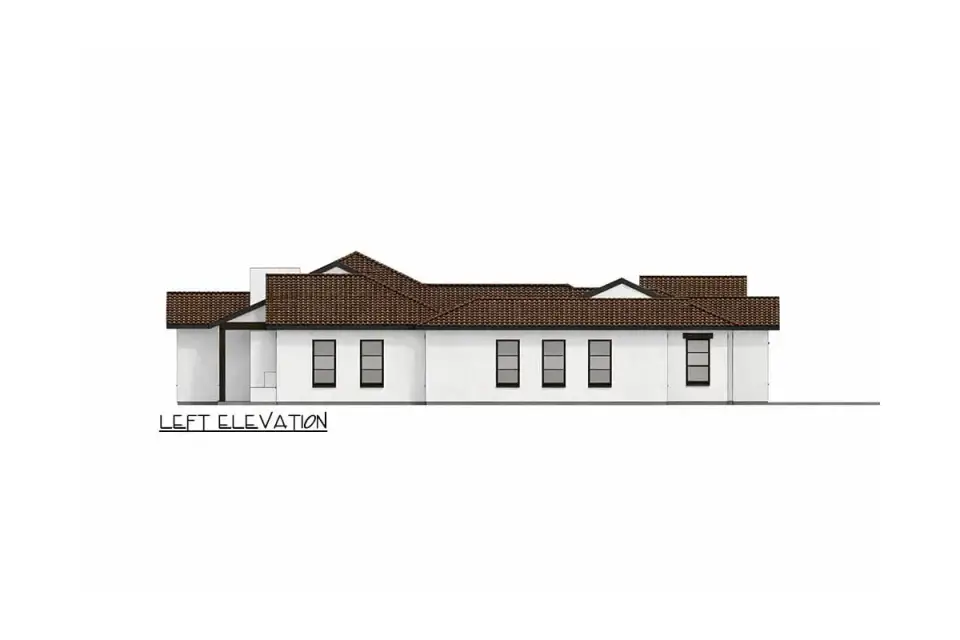 Mediterranean Spanish house plan twilight exterior with integrated facade lighting