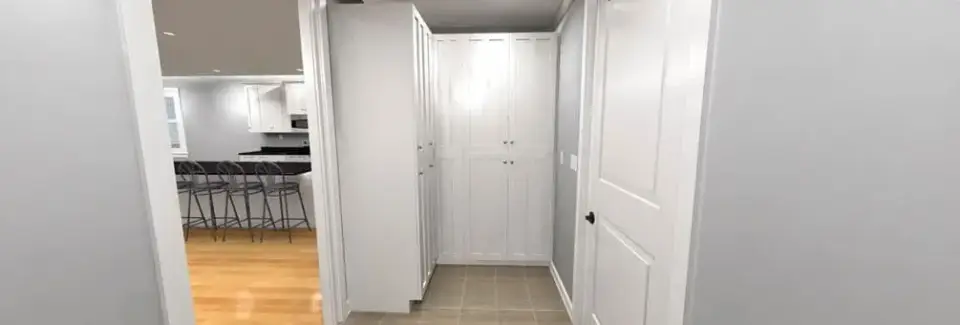 Entry hallway with light wood flooring