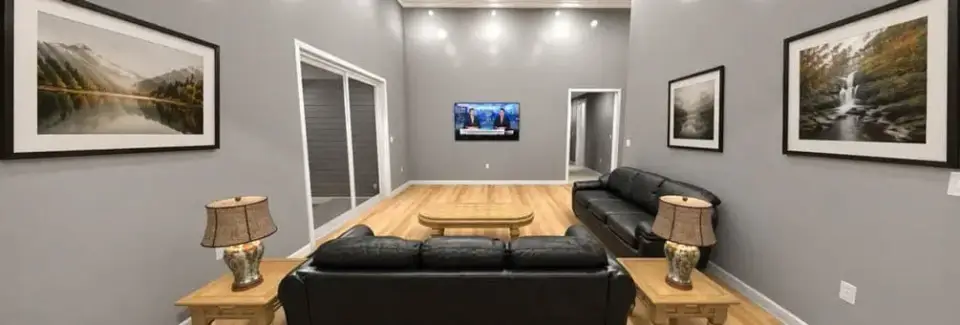 Living room with light wood floors and farmhouse styling