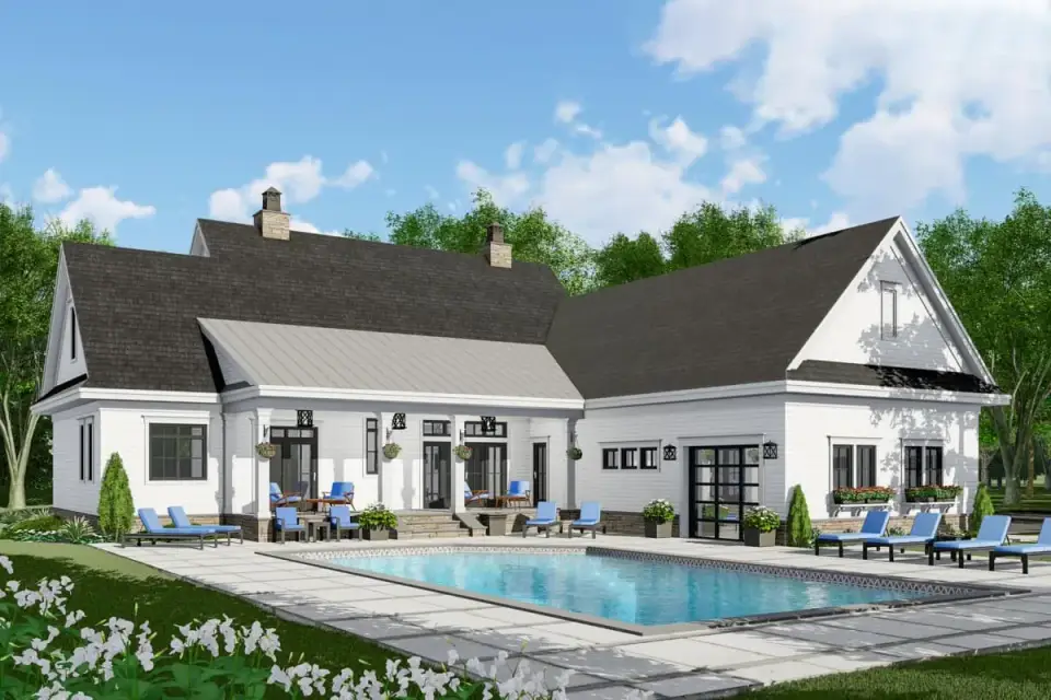 Side elevation showing the 3-car garage wing and stone veneer foundation