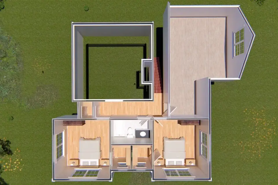 Plan 4122WM catwalk loft overlooking great room with iron balusters and wide plank wood floor