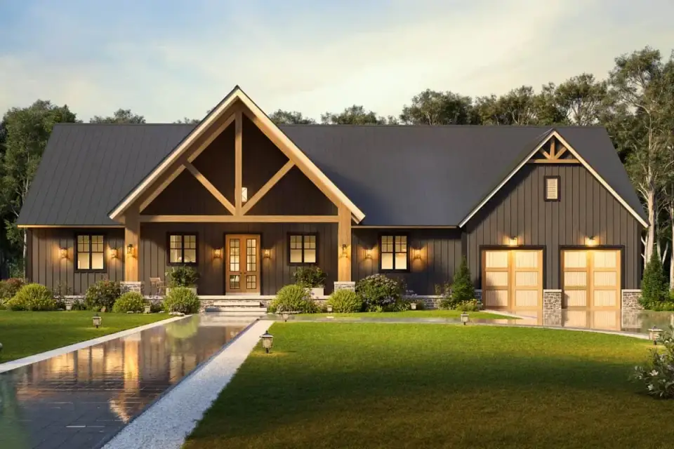 Modern farmhouse mountain exterior dark vertical siding and cedar trusses