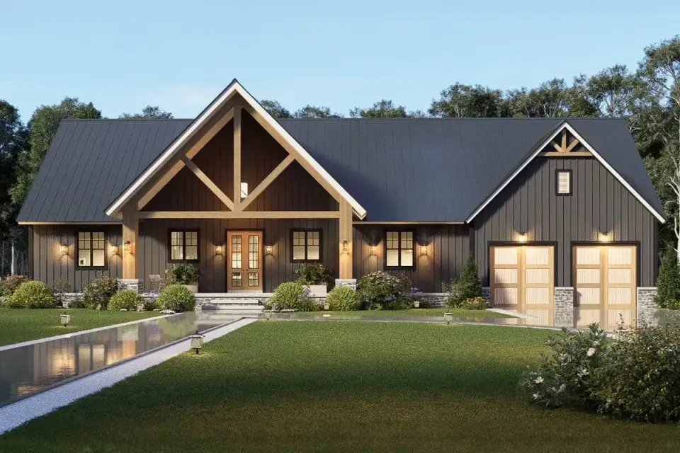 Modern farmhouse front facade with standing seam metal roof and black windows
