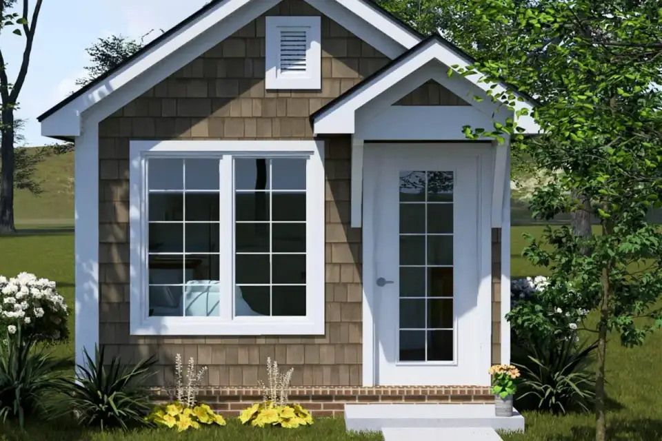 Plan 52530WM front gable end with small louvered vent dark asphalt shingle roof and white rake board trim