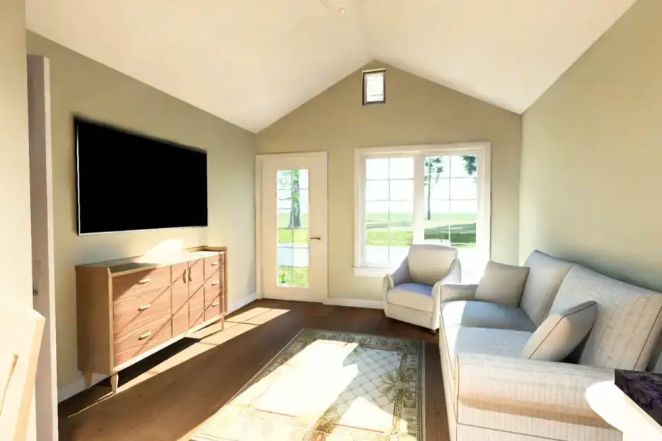 Plan 52530WM open living and kitchen view showing the drop from vaulted living ceiling to 8 foot kitchen ceiling