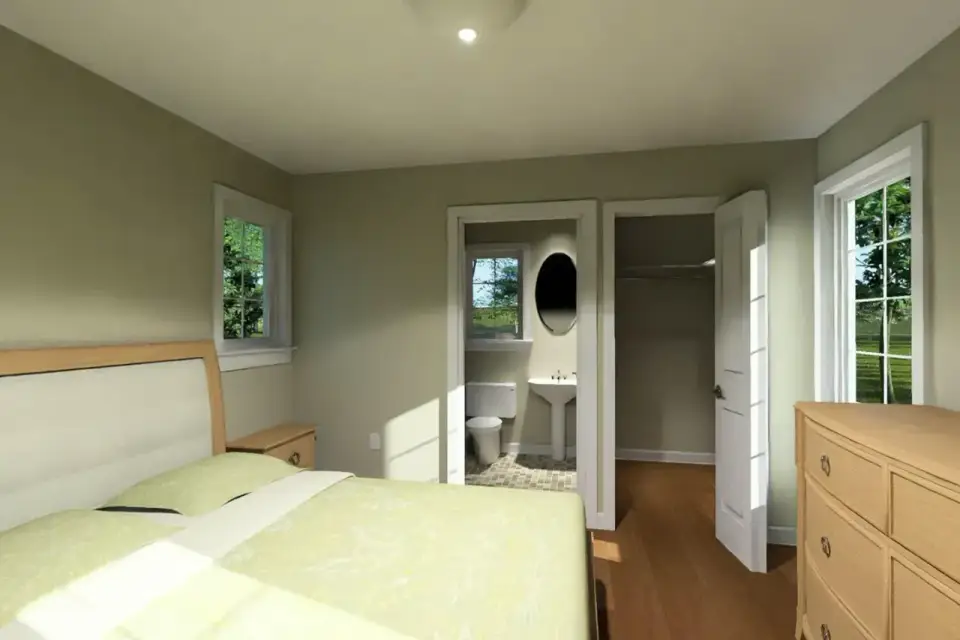 Plan 52530WM natural light through the large living room window and glass entry door across pale neutral finishes