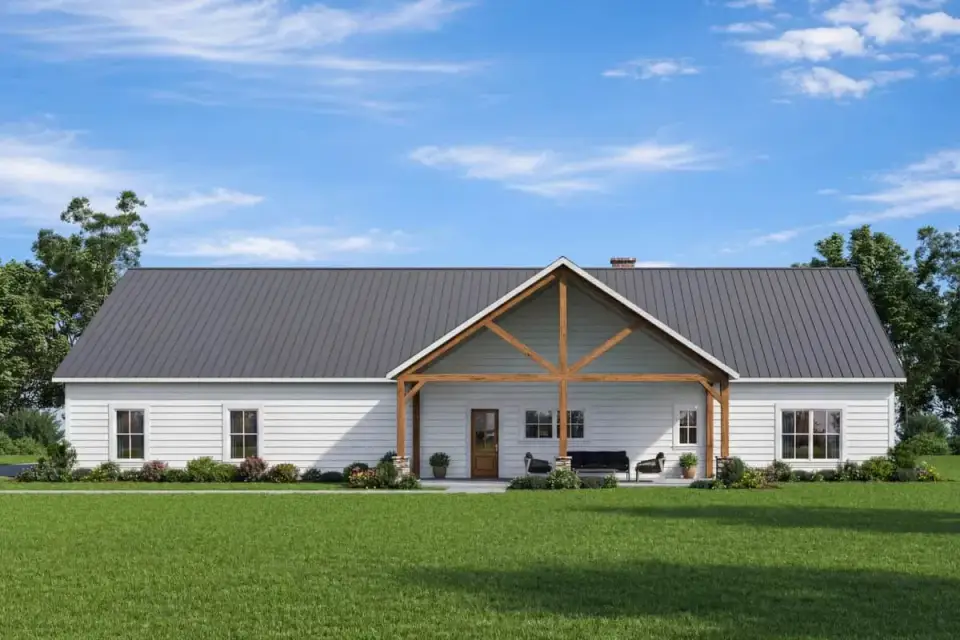 Side elevation of single-story 3,235 SF barndominium plan with horizontal siding and standing-seam metal roof