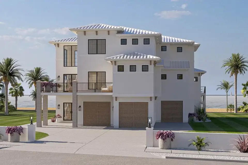 Side view of elevated coastal contemporary showing multi-level deck system and standing seam metal roof