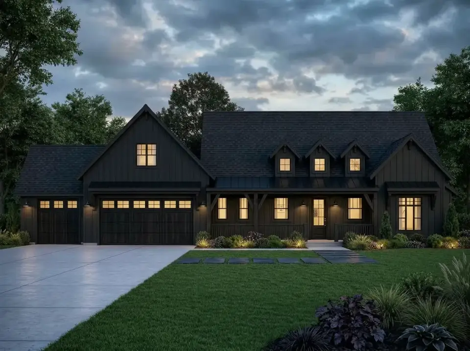 Midnight modern farmhouse facade at twilight with monochromatic black siding, roof, and trim, with warm interior light glowing through multi-pane windows