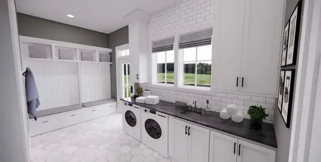 Upper-level laundry room with counter and sink