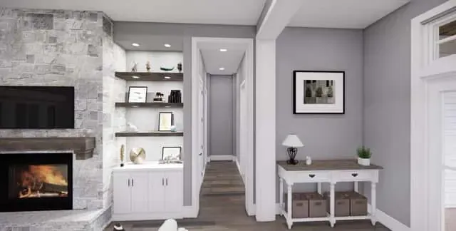 Great room fireplace built-ins detail with wide-plank light wood flooring